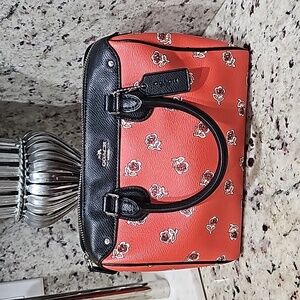 Coach elegant floral motif pocket book 9.5x8.5x4.5 inches